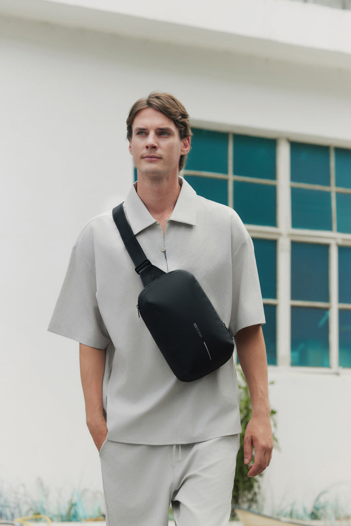 Urban Sling vettähylkivä laajennettava crossbody -laukku-9